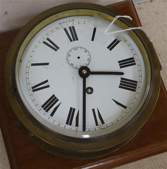 An Edwardian bulkhead timepiece